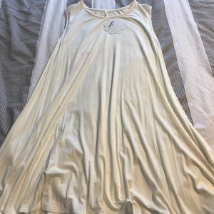 Cream part of me dress in Medium. Color Ivory.